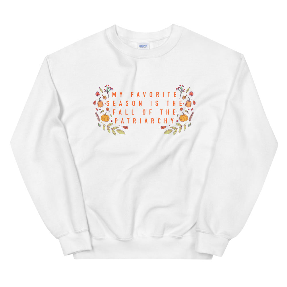 White feminist sweatshirt that says My Favorite Season Is The Fall Of The Patriarchy in bold orange writing surrounded by fall illustrations- shop Feminist Trash Store for Women’s Rights T-shirts, dump him shirts and political clothing