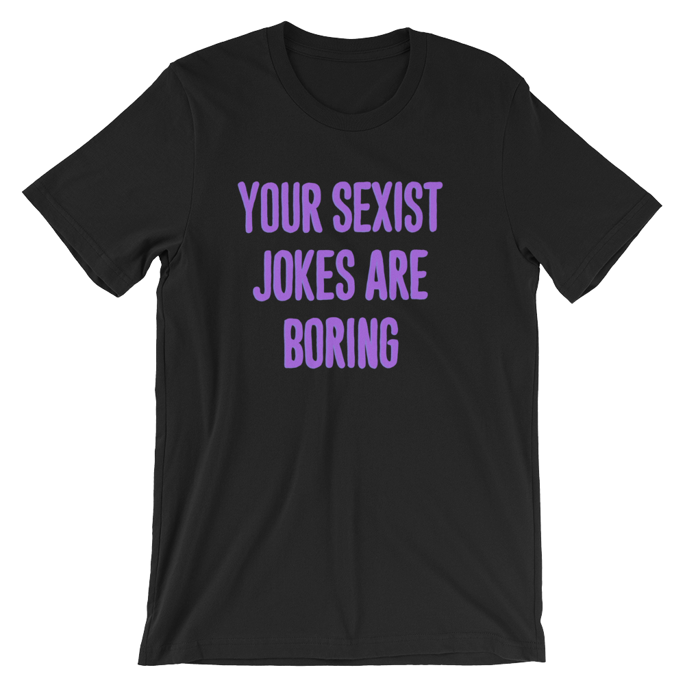 black feminist tee that says Your Sexist Jokes Are Boring in bold purple writing. Define feminism with our feminist apparel, political clothing, pride clothing, and dump him shirts