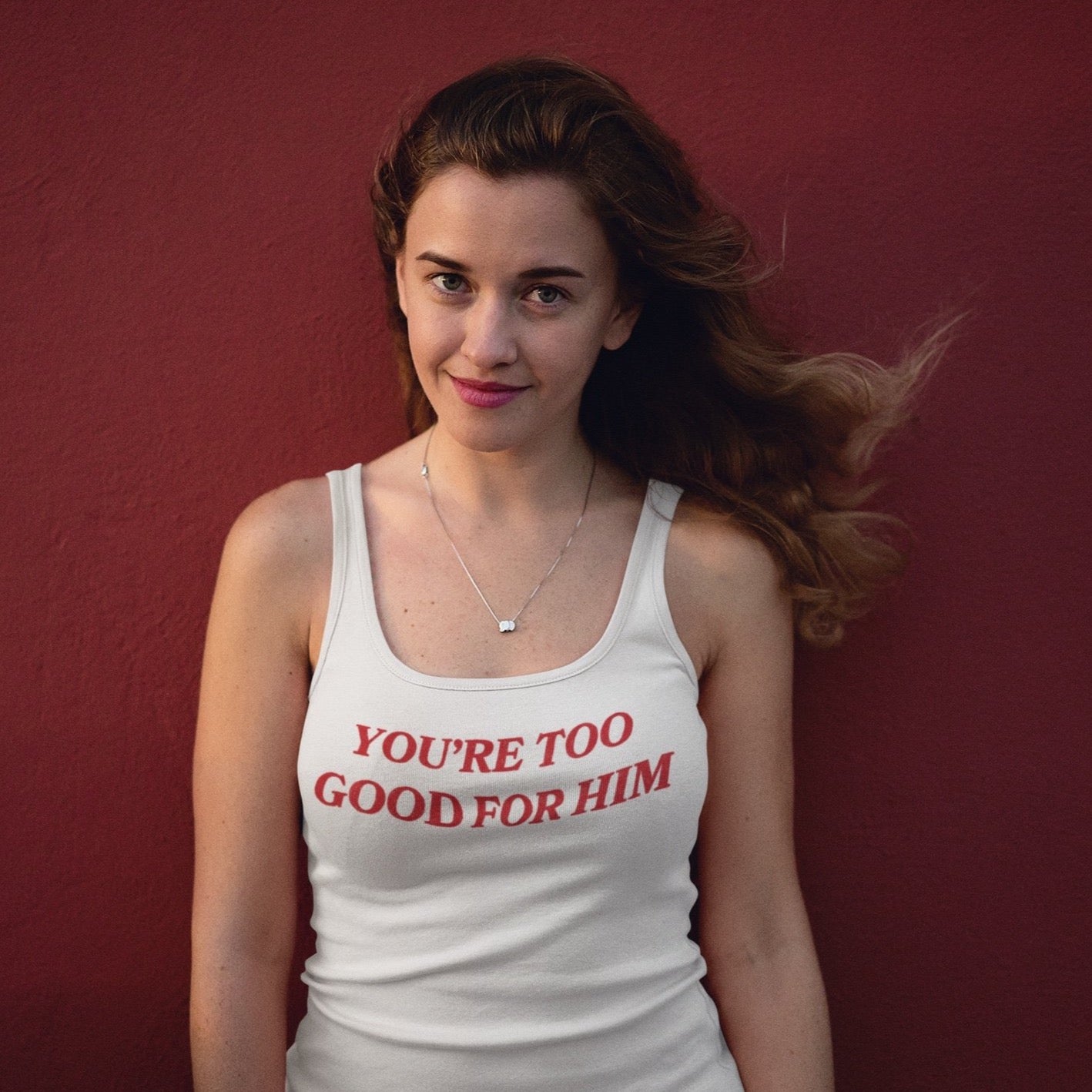 White feminist tank top that says you're too good for him in red writing- shop feminist trash for feminist tees dump him shirts and social justice apparel
