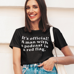 Black Feminist Tee That Says A Man With A Podcast Is A Red Flag In white lowercase retro esque writing