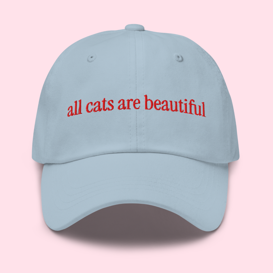 Say ACAB with this blue embroidered hat that says all cats are beautiful in red- shop feminist trash for dad hats for women and acab t-shirts