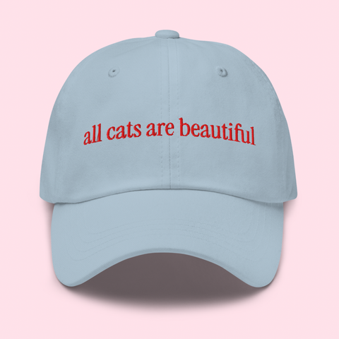 Say ACAB with this blue embroidered hat that says all cats are beautiful in red- shop feminist trash for dad hats for women and acab t-shirts