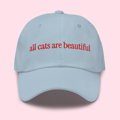 Say ACAB with this blue embroidered hat that says all cats are beautiful in red- shop feminist trash for dad hats for women and acab t-shirts