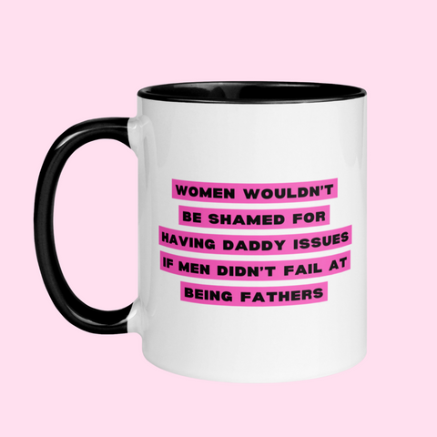 White feminist mug that says "women wouldn't be shamed for having daddy issues if men didn't fail at being fathers, in bold black text with a bright pink background. Shop feminist ceramics for the empowered woman.