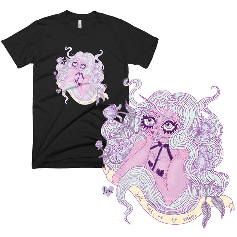 Black feminist shirt that says don't tell me to smile. featuring a purple alien unicorn woman with long light teal hair surrounded by peonies.