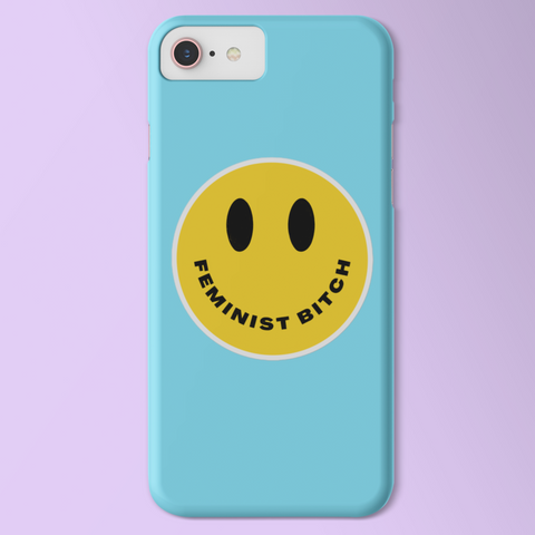 Retro groovy yellow smiley face feminist sticker with the text 'Feminist Bitch' replacing the smile.- Shop feminist stickers for empowered women