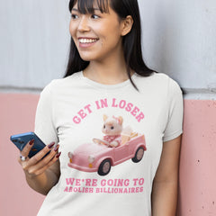 Funny Political t-shirt that says Get In Loser We're Going To Abolish Billionaires in pink bold retro writing, featuring a cute sylvanian families mouse driving a pink convertible car. Shop feminist trash store for political clothing, feminist t-shirts and acab tshirts 