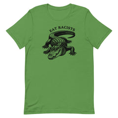 Green political shirt that says eat racists in black writing featuring a black alligator illustration- shop Feminist Trash for Political clothing and feminist apparel