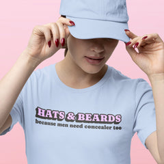 baby blue feminist tshirt that says hats and beards because men need concealer too in retro lilac and black writing- shop feminist trash for feminist shirts, pride merch and political clothing