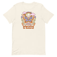 Vintage white political shirt that says migration is natural- shop Feminist Trash for political clothing and feminist apparel 
