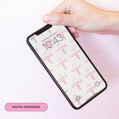 cute phone background featuring a coquette pink uterus pattern on a white textured background- Shop Feminist Trash for this phone wallpaper background and i phone wallpapers