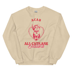 Sand coloured ACAB sweatshirt featuring a red cat illustration in a heart with the words all cats are beautiful in red caps and script font. Shop Feminist Trash for political clothing, acab t-shirts and abortion is healthcare shirts