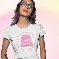 White feminist tshirt that says stab the patriarchy featuring an illustration of a pink poodle head with a knife in it's mouth. Shop social justice feminist apparel