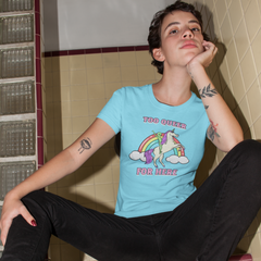 blue pride tshirt that says too queer for here in pink writing. featuring a green alien riding a unicorn with a rainbow background. Shop Pride Themed shirts