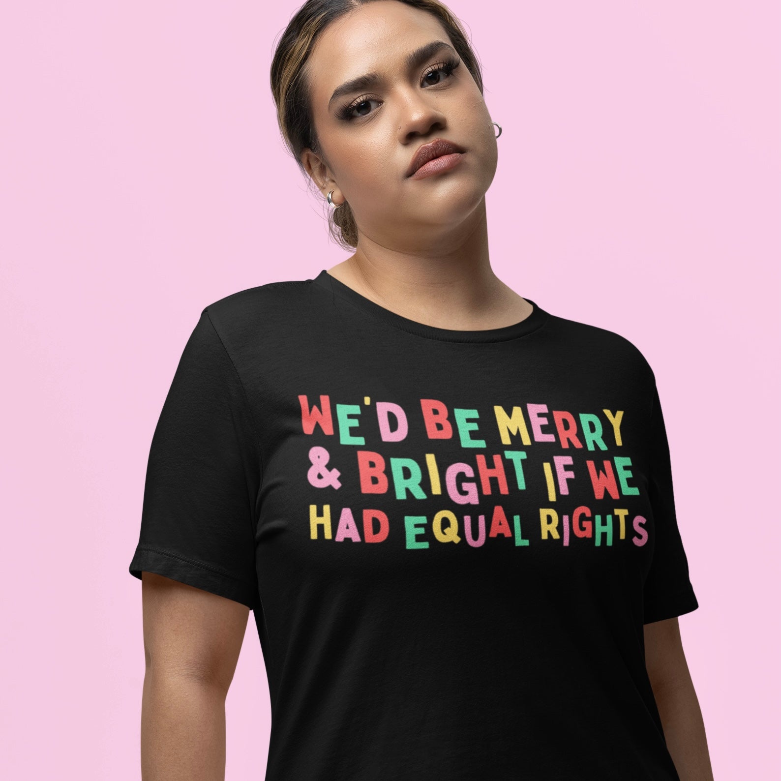 feminist Christmas Tee that says We’d be merry and bright if we had equal rights in Christmas coloured letters. Shop feminist trash for political clothing and feminist merch