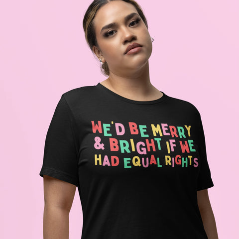 feminist Christmas Tee that says We’d be merry and bright if we had equal rights in Christmas coloured letters. Shop feminist trash for political clothing and feminist merch