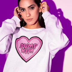 Image of a white feminist dump him sweatshirt with a hand-illustrated heart and 'Dump Him' hand-lettered in bubble writing. This empowering sweatshirt is perfect for making a bold statement. Shop our feminist sweatshirts today!