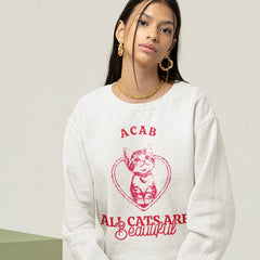 White ACAB sweatshirt featuring a red cat illustration in a heart with the words all cats are beautiful in red caps and script font. Shop Feminist Trash for political clothing, acab t-shirts and feminist clothing