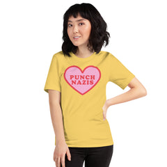 Yellow Political shirt that says punch nazis in red retro font  inside a pink heart- shop Feminist Trash for this anti fascist shirt, acab t-shirts and political clothing