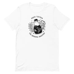 white feminist tee that says aqua tofana the original solution in black art nouveau sstyle writing. Featuring a black tattoo style illustration of a poison bottle- Shop feminist trash for feminist tees and dump im shirts.