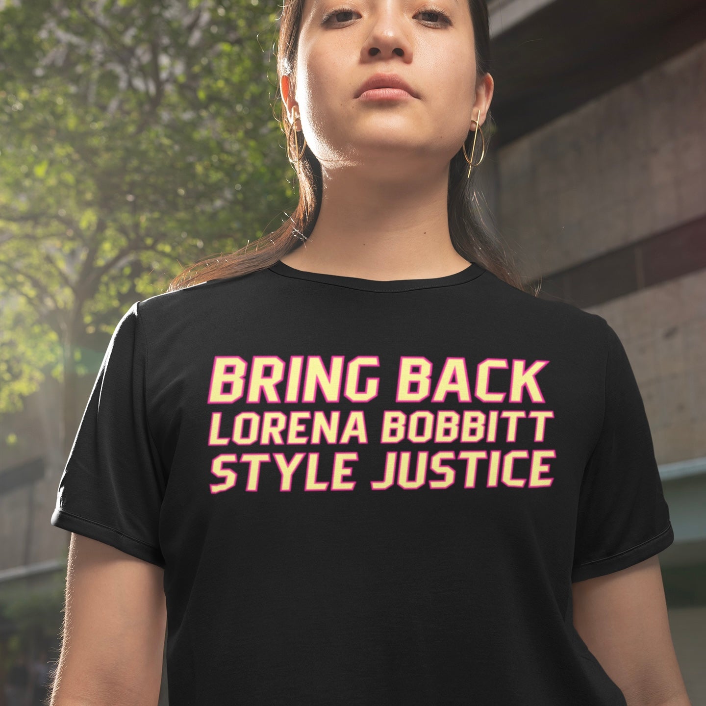 feminist tshirt that says bring back Lorena Bobbitt style justice in yellow writing- shop Feminist Trash for feminist apparel and political clothing