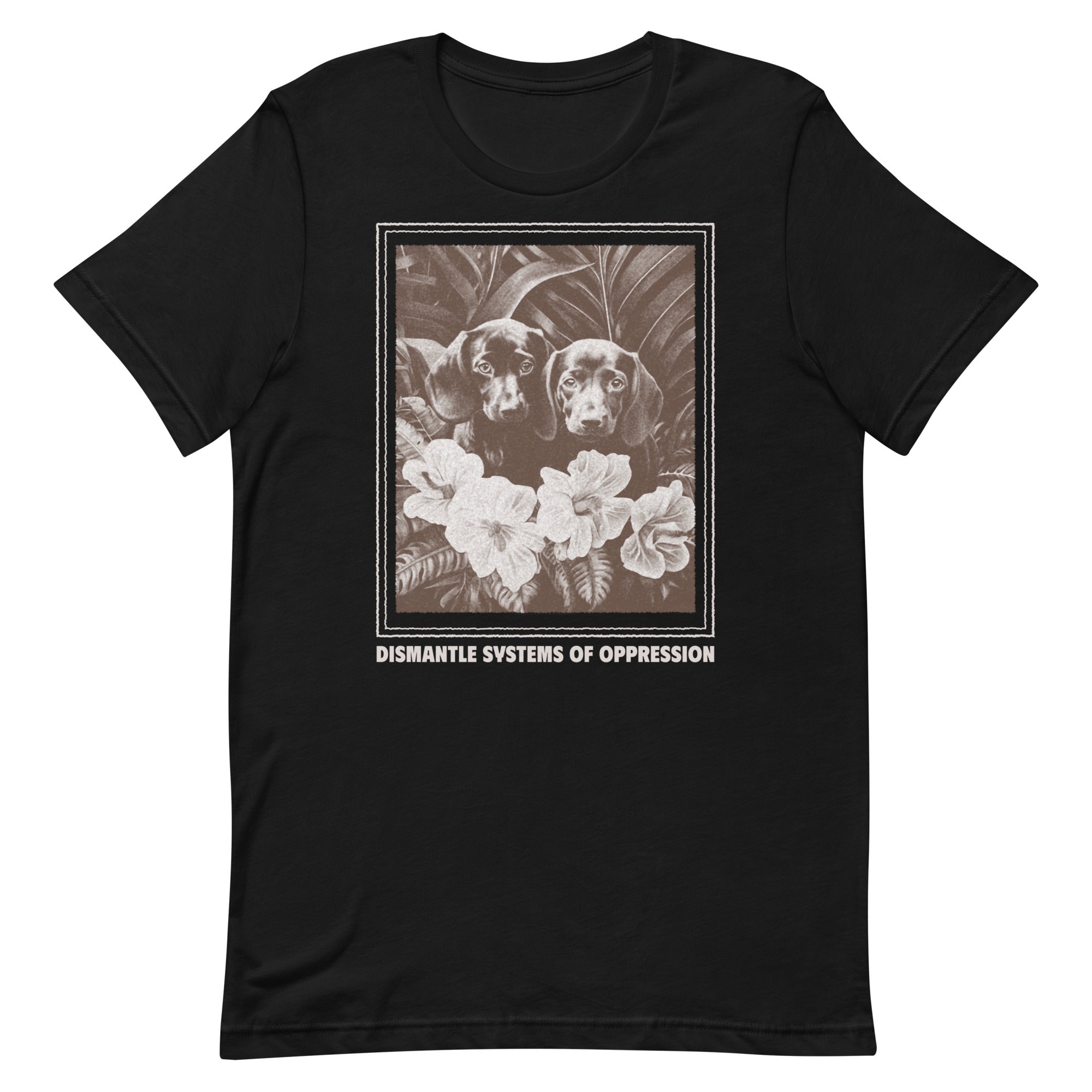Flat lay of a black Feminist Trash t-shirt featuring a vintage dachshund illustration and the text "Dismantle Systems of Oppression."