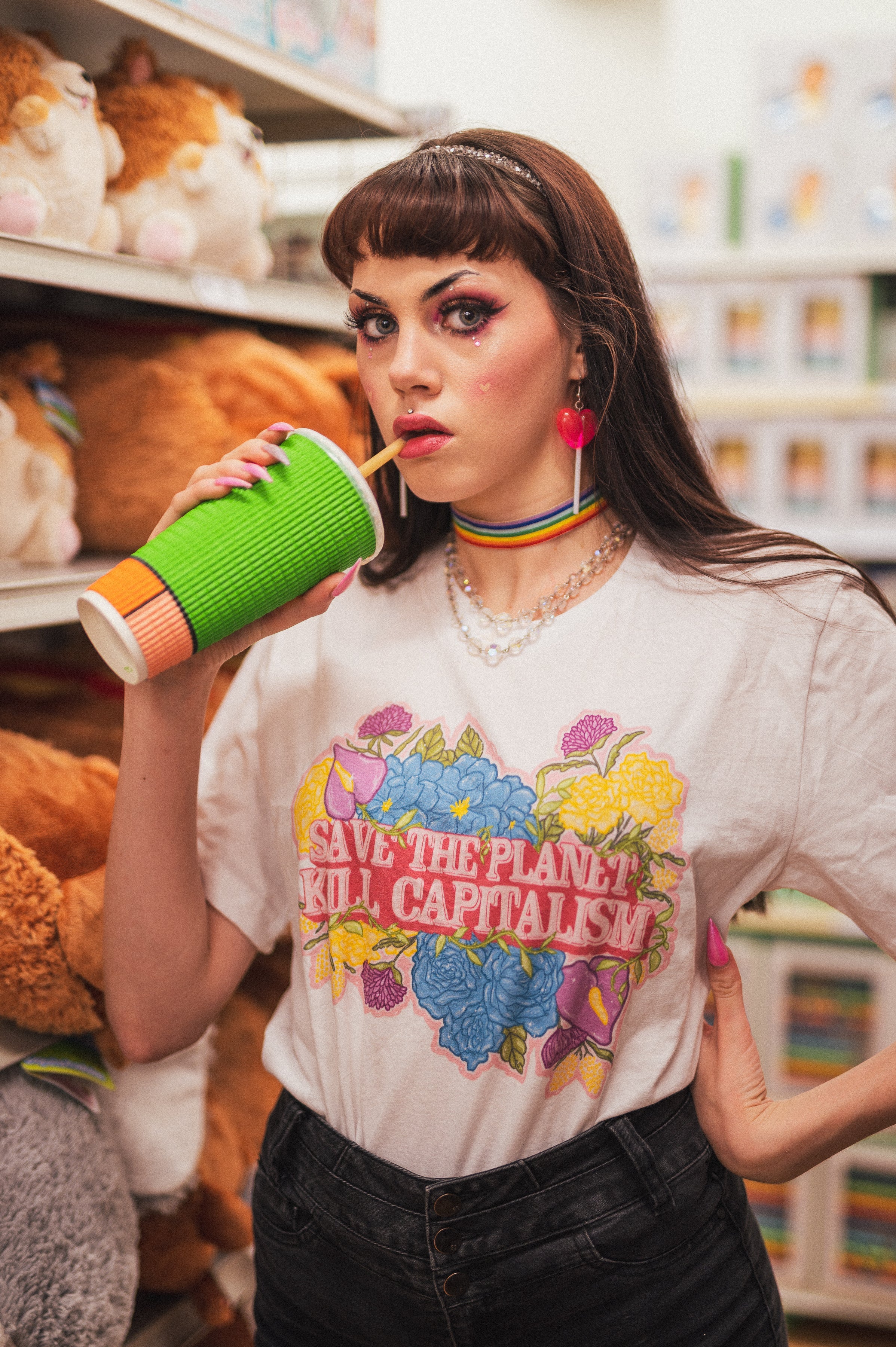 Empowering white feminist shirt featuring statement "Save The Planet Kill Capitalism
