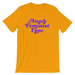 Gold feminist t-shirt boldly proclaiming "Angry Feminist Type."