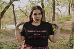 Black feminist t-shirt conveying: "Against Abortions? Get a Vasectomy."