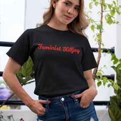 Black feminist t shirt boldly proclaiming "Feminist Killjoy" in red writing