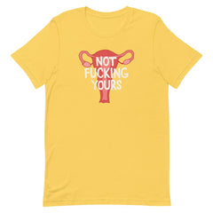 Yellow feminist t-shirt boldly asserting "Not Fucking Yours" with an image of a uterus
