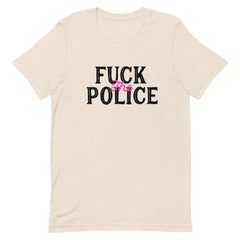 Soft cream feminist t shirt boldly featuring "Fuck the Police" in black and pink writing