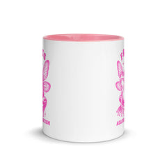 Side view of the Frogs Against Fascism mug showing the pink interior and ergonomic handle design.