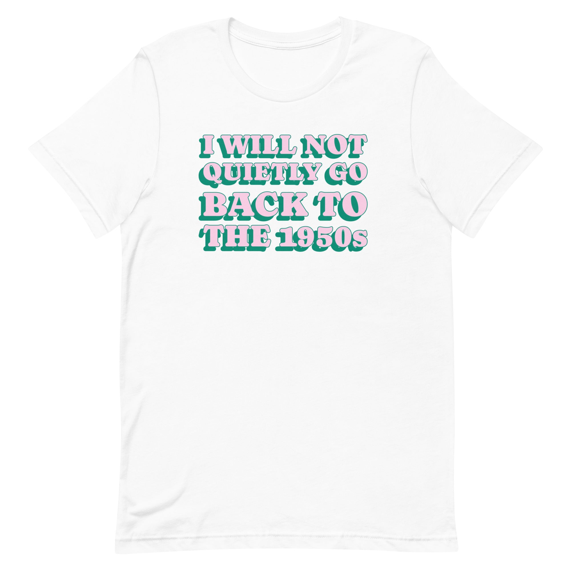 Flat lay of a white Feminist Trash t-shirt featuring the text "I WILL NOT QUIETLY GO BACK TO THE 1950s" in a pink and green retro bubble font. This ethical, 100% vegan cotton feminist tee is made-to-order to reduce waste.