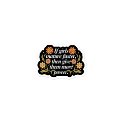 feminist sticker that says if girls mature faster than give them more power in white writing surrounded by orange floral illustrations- shop feminist trash for feminist stickers 