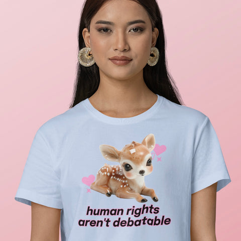 baby blue political tshirt that says human rights aren't debatable in black writing featuring a 3d image of a baby deer. Shop feminist trash for political clothing and feminist t-shirts