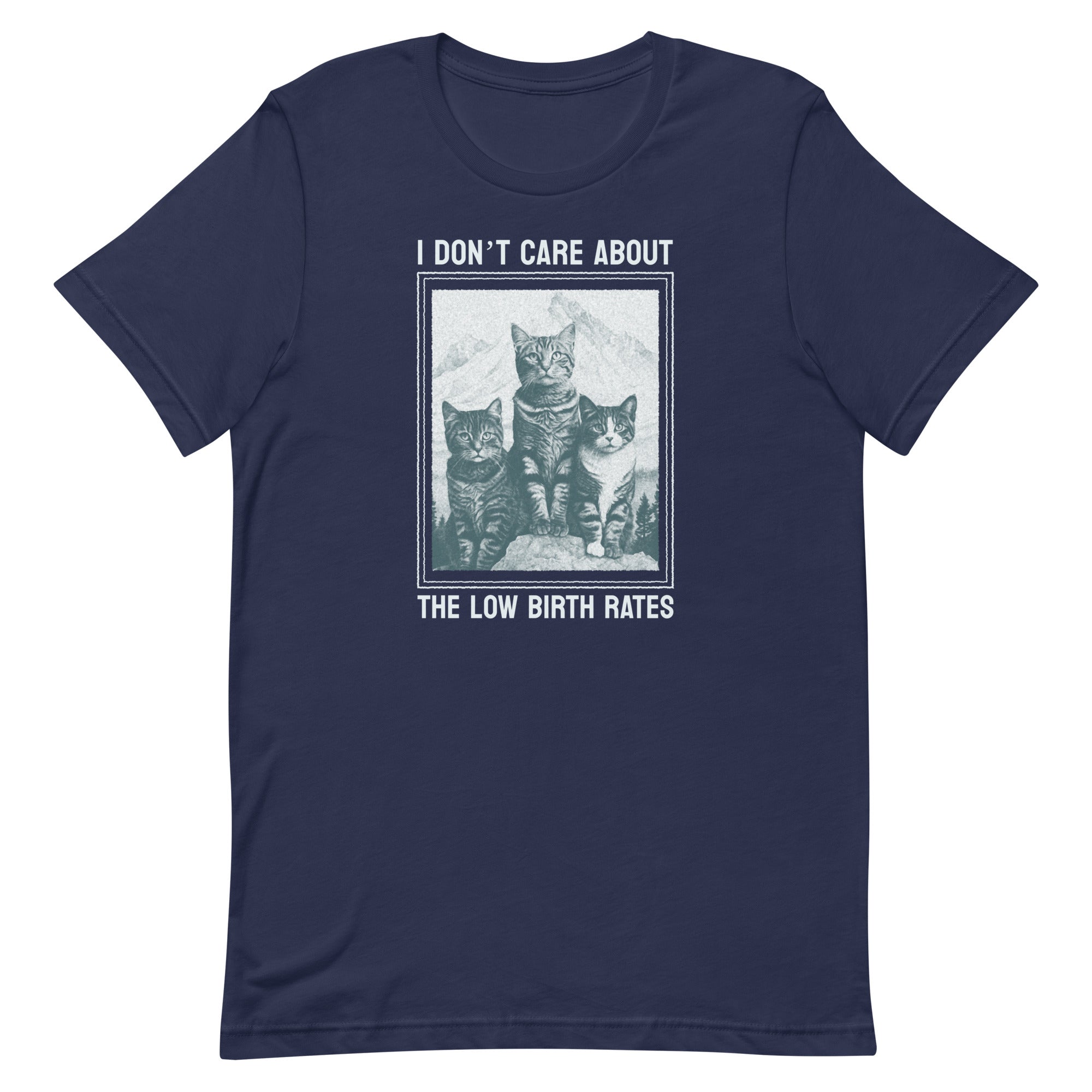 Navy blue graphic t-shirt showing three cats in a framed vintage illustration with the text "I DON'T CARE ABOUT THE LOW BIRTH RATES." Edgy feminist fashion.