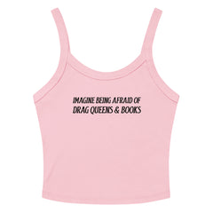 pink crop top that says imagine being afraid of drag queens and books in black writing- shop feminist  trash for political clothing and feminist t-shirts