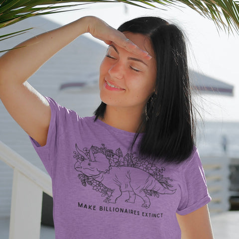 purple political t-shirt that says make billionaires extinct in black writing. Featuting floral illustration of a Triceratops- Shop feminist trash for political clothing and anti fascist tees