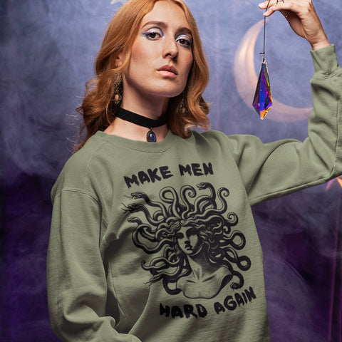 army green feminist sweatshirt that says make men hard again- featuring a black medusa illustration. shop feminist trash for funny feminist sweatshirts and witchy clothing