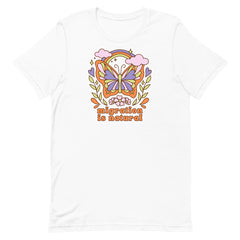 Classic white political t-shirt featuring a colorful graphic of a butterfly framed by leaves and flowers with the phrase migration is natural written in orange bubble letters.