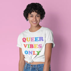 Pride t-shirt in white proclaiming "Queer Vibes Only" in rainbow writing