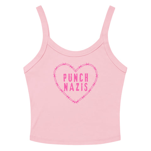 pink spaghetti strap crop top that says punch nazis in pink distressed writing inside of a barbed wire heart. Shop feminist trash for political clothing, feminist apparel and acab tees