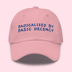 pink political hat that says radicalized by basic decency in blue- shop feminist trash for political clothing