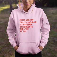 pink feminist hoodie that says Roses Are Red, Violets Are Blue All Western Governments Are Lying To You in bold red writing - Unisex Feminist Hoodie - Feminist Trash Store - Shop Women’s Rights T-shirts