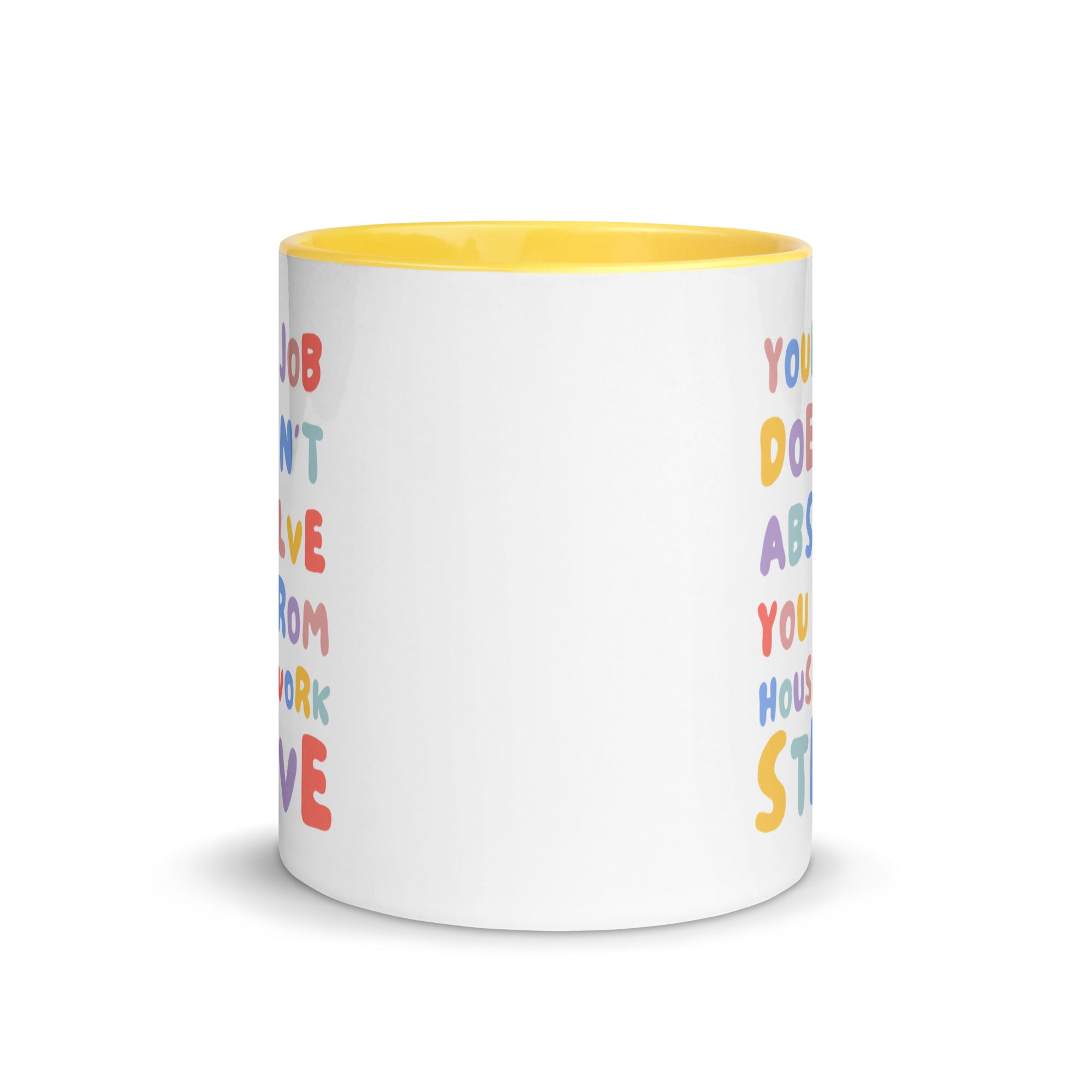 Feminist message mug with yellow handle and colorful block text about domestic labor, isolated on a white background.