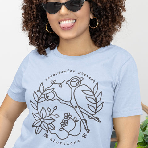 pro choice feminist tee that says vasectomies prevent abortions in black writing- featuring a floral tattoo scissor design. Shop feminist trash for pro choice t-shirts and political clothing