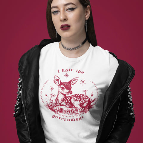 white political shirt that says i hate the government featuring a cute dark red illustration of a deer sitting amongst flowers. Shop Feminist Trash Store for political clothing, feminist shirts and acab t-shirts.