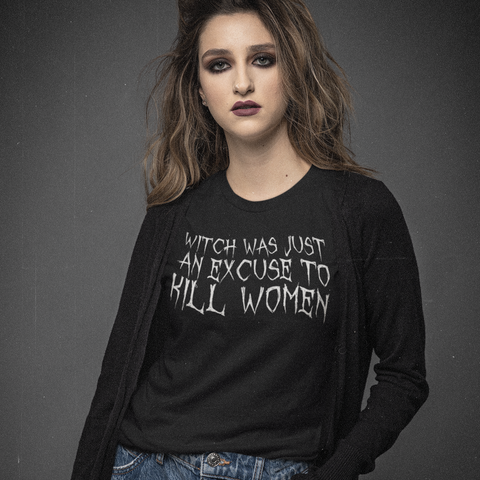 black feminist t shirt that says witch was just an excuse to kill women in white gothic writing- shop feminist trash for witchy outfits and feminist shirts