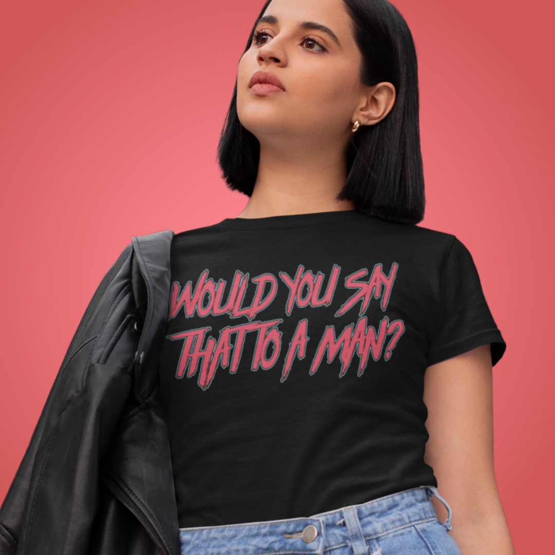 black feminist tee that says would you say that to a man in red heavy metal writing- shop feminist trash for women's march merchandise and women rights shirts